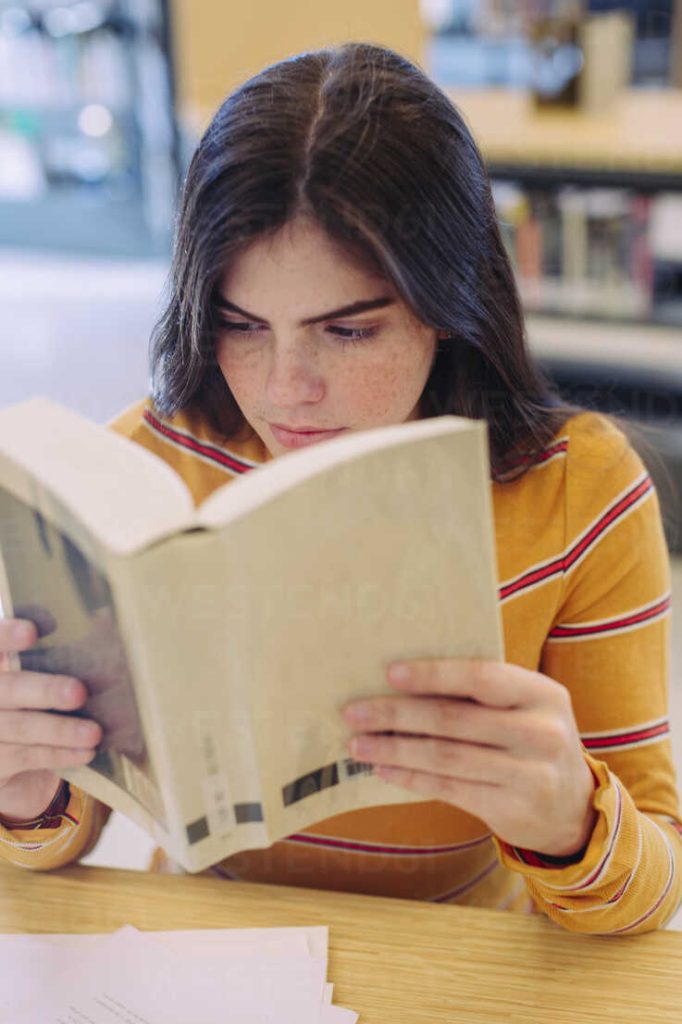 woman reading seo glossary of terms